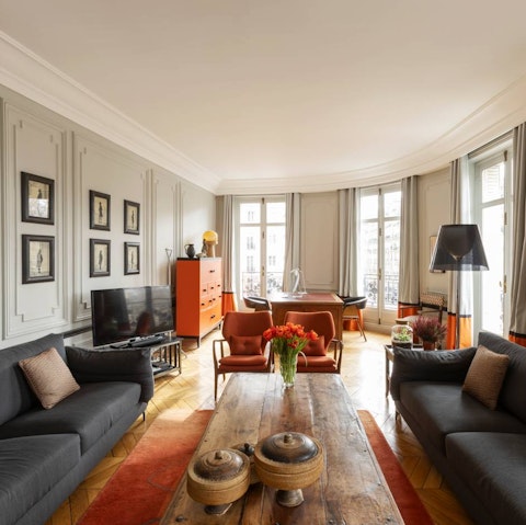 Soak up rooftop views from the light-filled living room