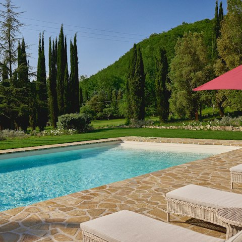 Find peace and relaxation while lounging by the pool