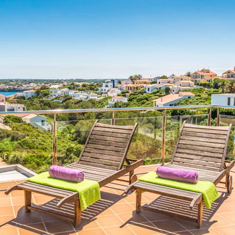 Soak up the Menorcan sunshine from the terrace loungers