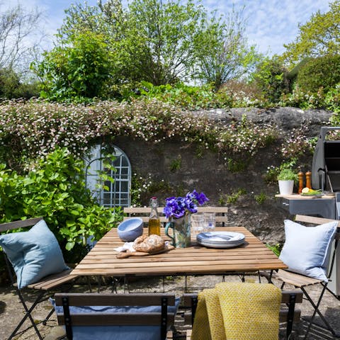 Enjoy sunny breakfasts and alfresco barbecues in the beautiful garden