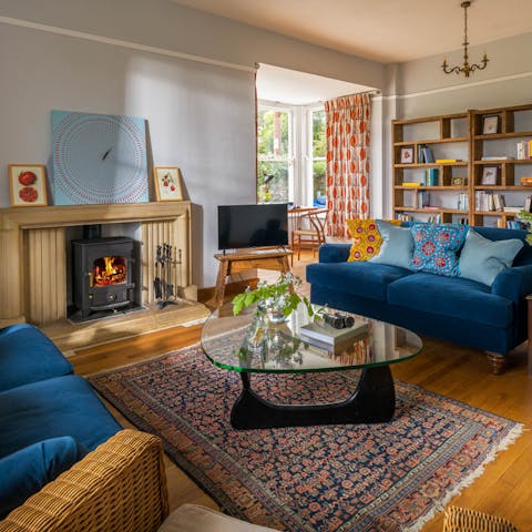 Snuggle up by the living room's fire on cooler evenings