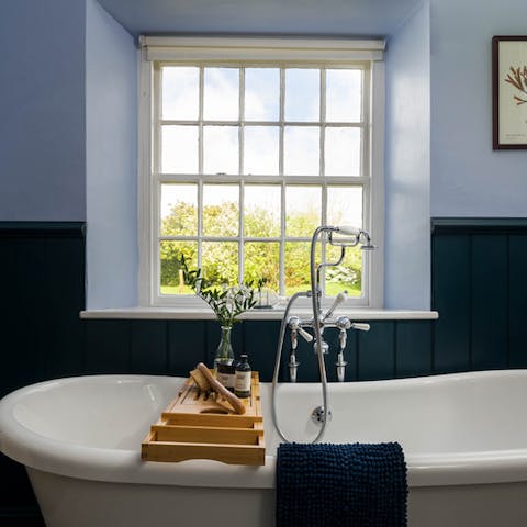Treat yourself to a luxurious soak in the roll-top tub after a day of sightseeing and exploring
