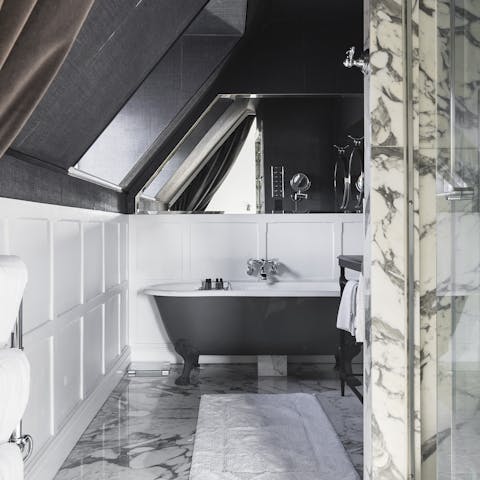 Treat yourself to a relaxing soak in the roll-top bathtub