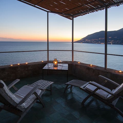 Watch the sunset over the Mediterranean