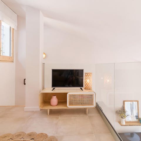 Let the kids watch cartoons upstairs with the second TV