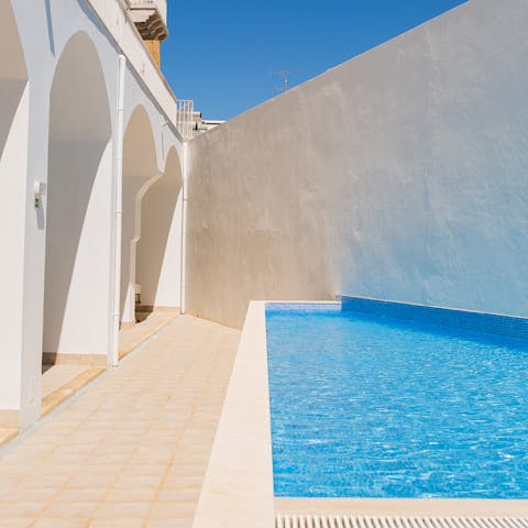 Make the most of the building's communal pool