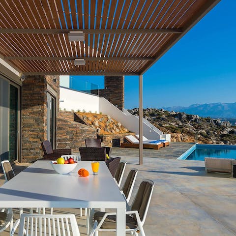 Tuck into a home-cooked souvlaki and chips on the veranda terrace