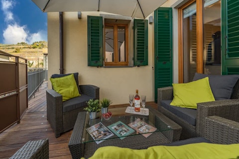 Spend the evening sipping rosé and playing cards on your private terrace