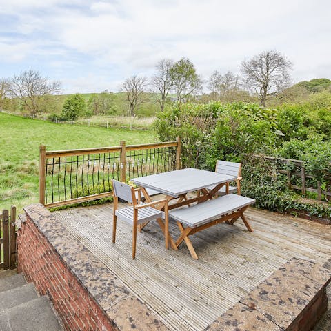 Enjoy an alfresco dinner as you admire the stunning countryside views
