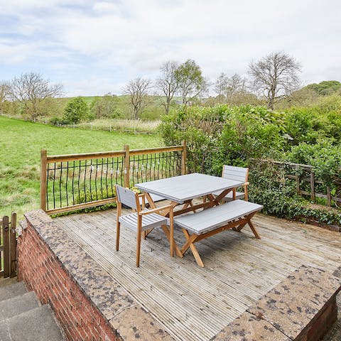 Enjoy an alfresco dinner as you admire the stunning countryside views