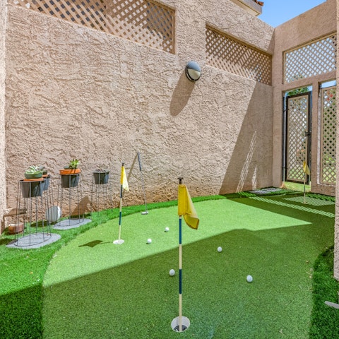 Pass some time on the private putting green