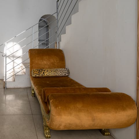 Recline on the velvet chaise longue