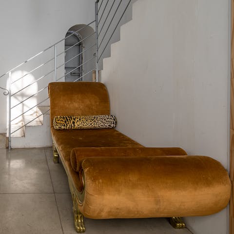 Recline on the velvet chaise longue