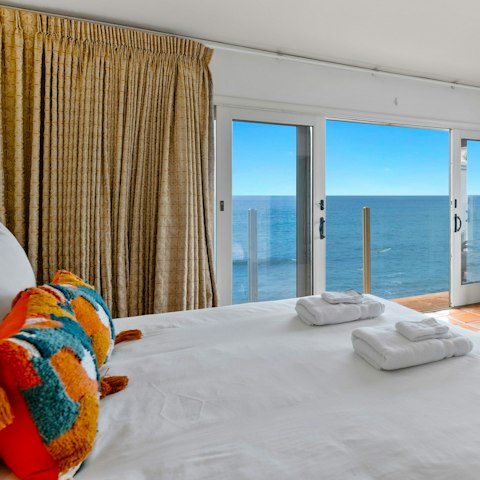 Wake up to ocean views in the main bedroom