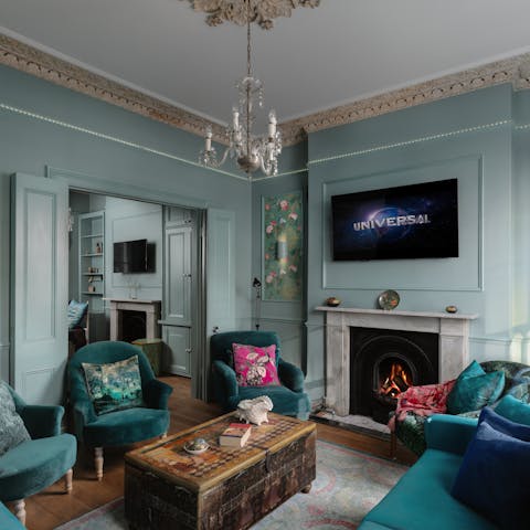 Watch a movie in front of the crackling fire