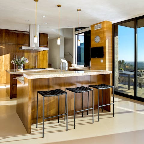 Dial up a private chef to get busy in the sleek kitchen