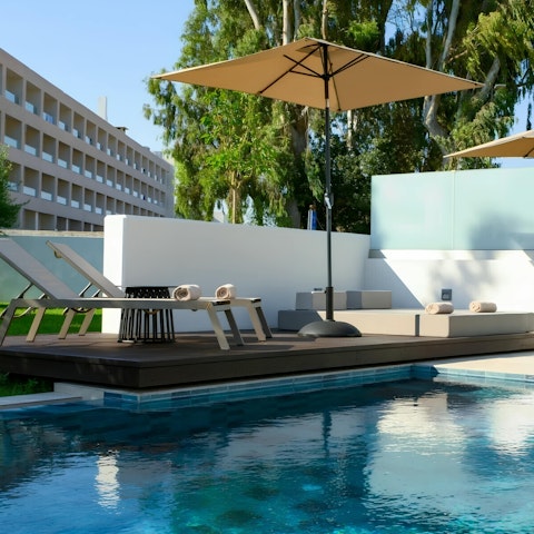 Enjoy long lazy days lounging by your private pool