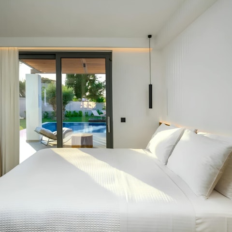 Wake up to sunshine and pool views from the comfortable bedrooms