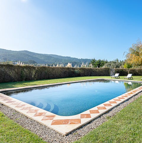 Cool down with a dip in the pristine swimming pool