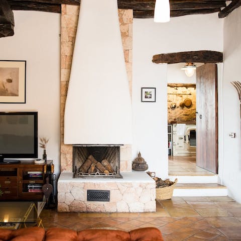 Warm up by the feature fireplace