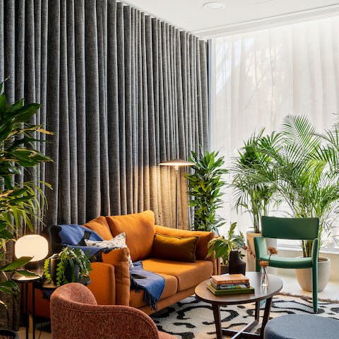 Leaf through the collection of coffee table books as you relax in the beautiful shared lounge