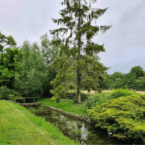 Find tranquility by the River Great Ouse which runs through the home's six acres of grounds
