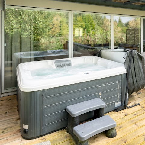Soak in the hot tub after a fun, watersports-filled day