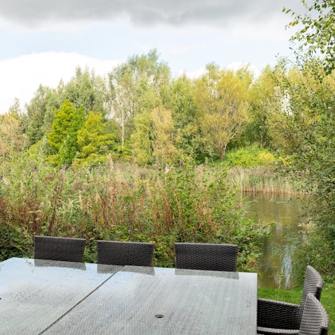 Tuck into dinner on the terrace with lake views