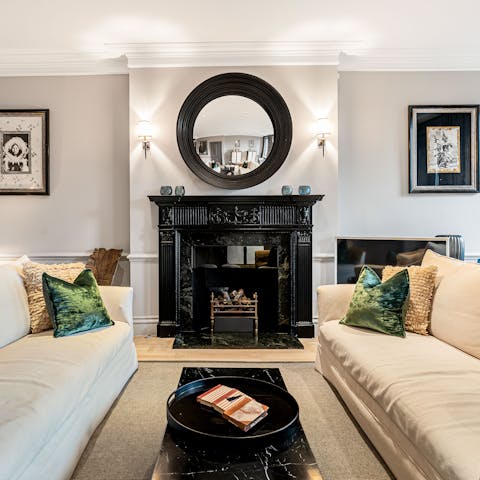 Gather for cosy evening drinks in the living room