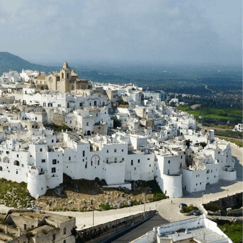 Wander through the white-washed streets of Ostuni