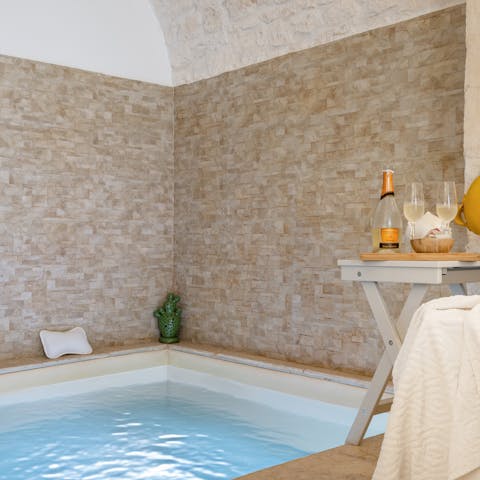 Unwind with a glass of bubbly in the bedroom's private pool