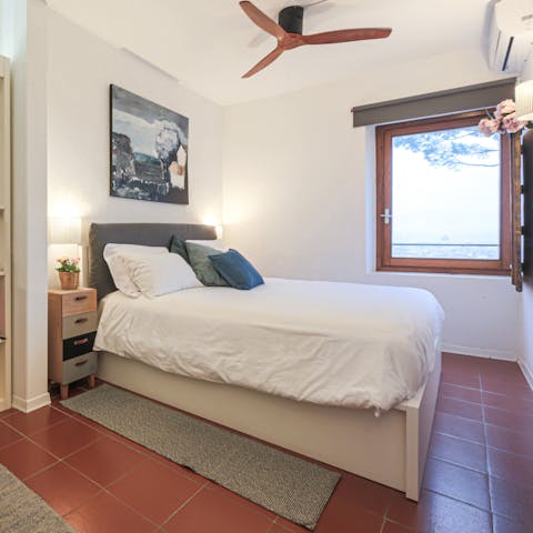 Sink into the cosy bed after a long day of sightseeing