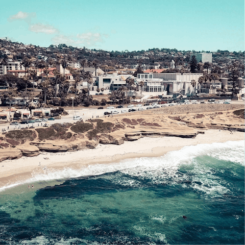 Cross the road and sink your feet into the sand of La Jolla Shores beach