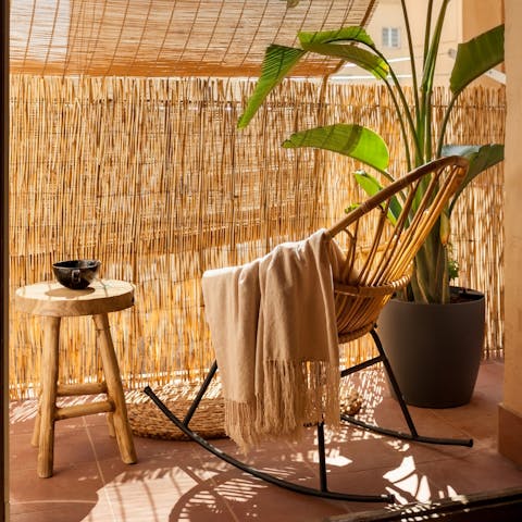 Cosy yourself away on the shaded balcony with your morning cup of coffee