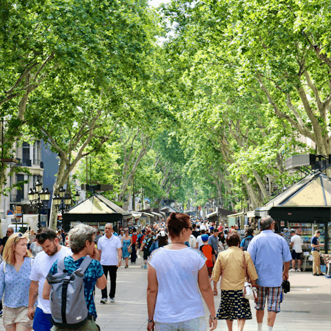 Stroll along leafy Las Ramblas, twenty minutes away on foot