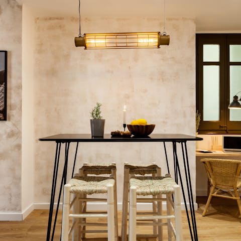 Enjoy an evening of homemade tapas at the bar-style dining table