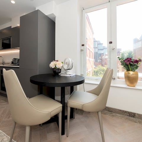 Set up a remote workspace at the intimate table, easy for emailing