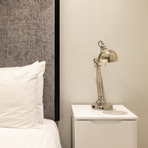 Sleep peacefully in the stylish monochrome bedroom