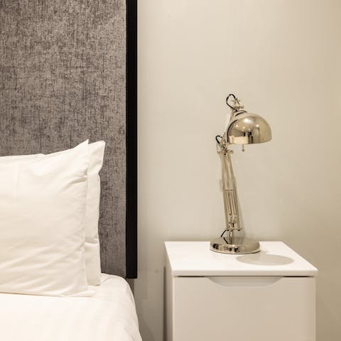 Sleep peacefully in the stylish monochrome bedroom