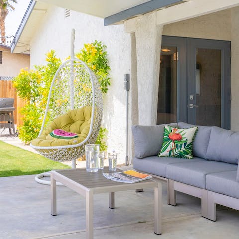 Settle into the hanging chair with a good book and pitcher of ice cold lemonade
