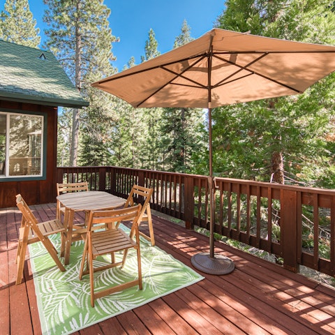 Find peace amongst the trees while dining on the deck