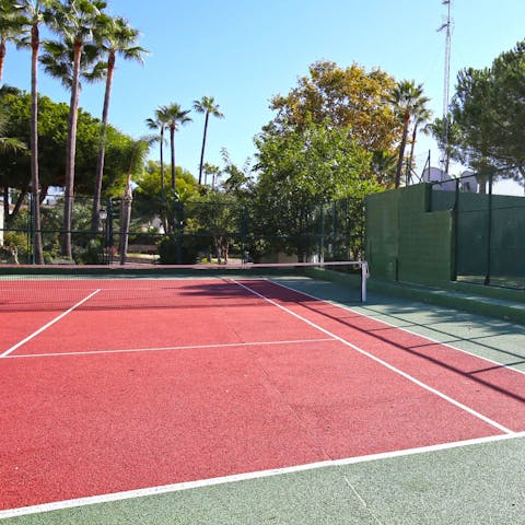 Get your endorphins flowing with a tennis match on the shared court