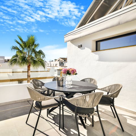 Sit down to a typical Spanish breakfast on the balcony