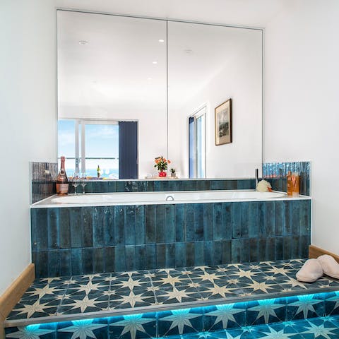 Unwind with a long, luxurious bubble bath in one of the tubs