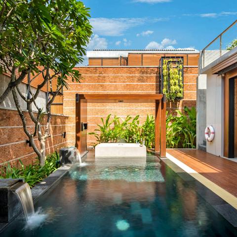 Dive into the refreshing depths of your very own private pool and enjoy your patch of paradise