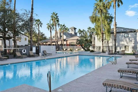 Cool off in the communal pool on a clear Arizona day