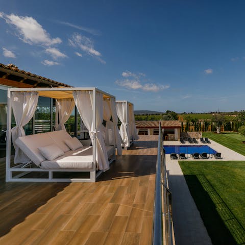 Relax on the balcony, lounging on a day bed