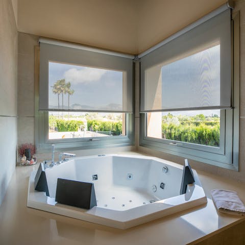 Sip Champagne in the Jacuzzi tub of the main bedroom