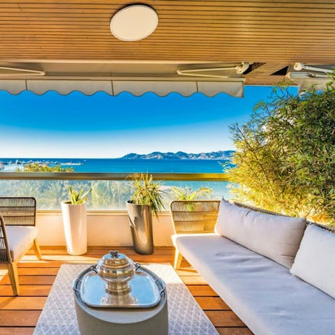 Admire the beautiful views over the sea and Port Canto from the balcony