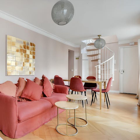 Relax in the living room with a glass of French wine